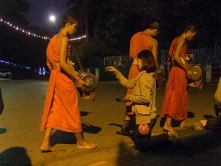 Buddhist alms giving ceremony.